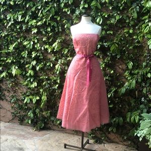 Strapless BCBG tea length semi formal  dress.